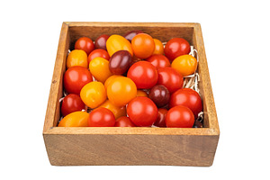 Mixed heirloom cherry tomatoes in a rustic wooden box overhead s, a Food & Drink Photo by composter-box@mail.ru