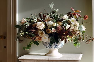 Elaborate floral arrangement with various flowers and foliage in, a Photo by Studio ANNA