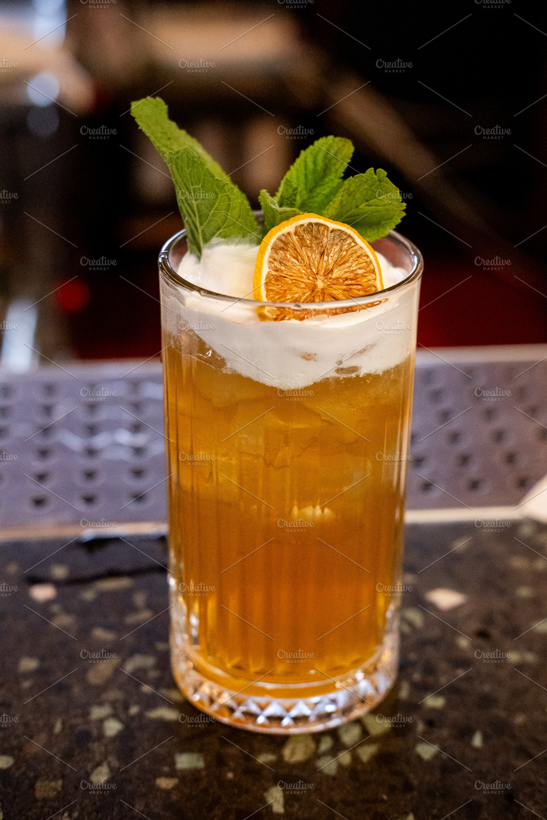 Cocktail glass citrus drink ice mint fruit cream, a Food & Drink Photo by Photo Drive Studio