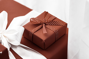 Holiday gifts and wrapped luxury presents, chocolate gift boxes, a Holiday Photo by Studio ANNA