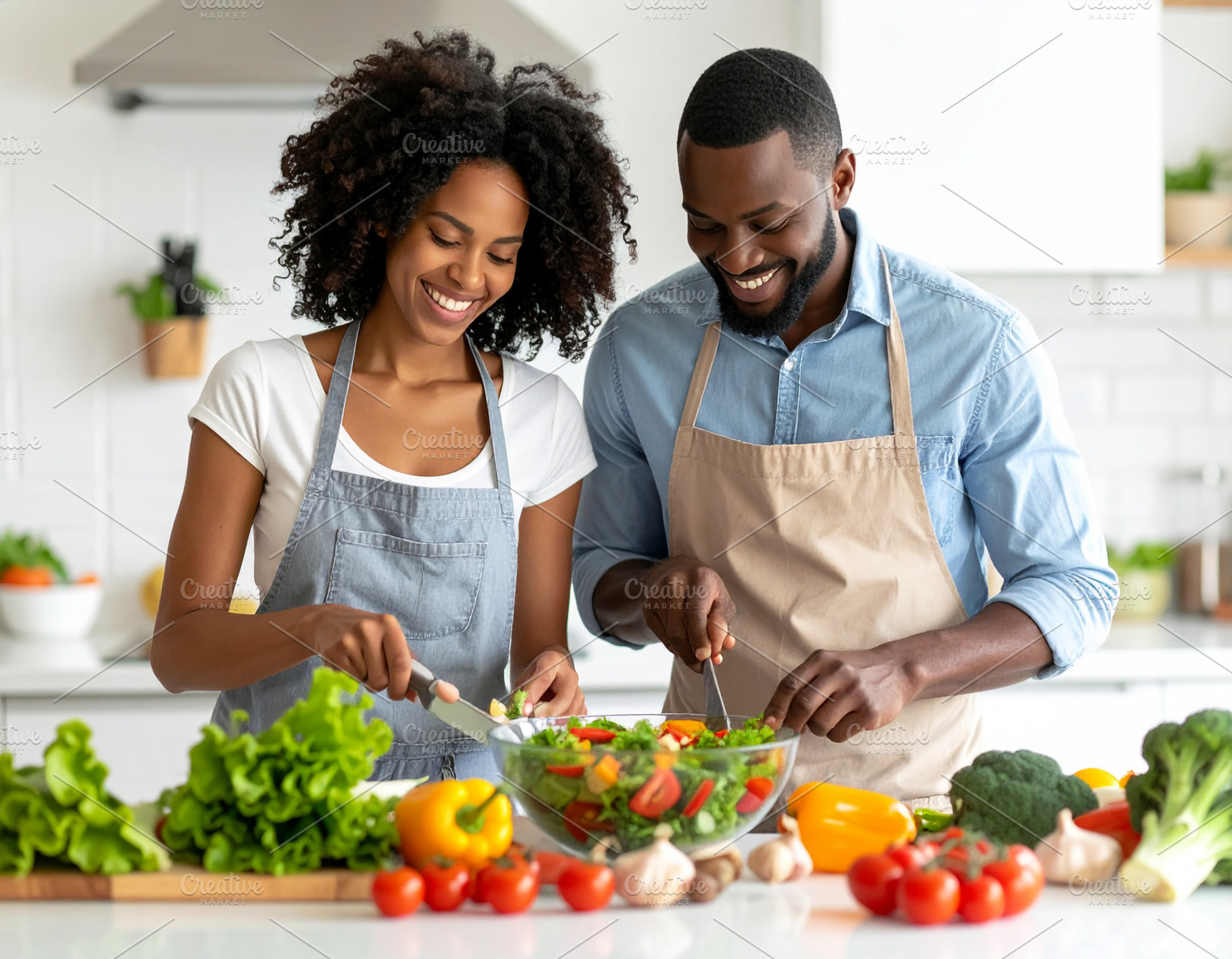 Diverse couple preparing a colorful salad in a bright kitchen, a Food & Drink Photo by DanFLCreativo