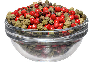 A clear glass bowl filled with a mixture of colorful red, green,, a Food & Drink Photo by ndanko
