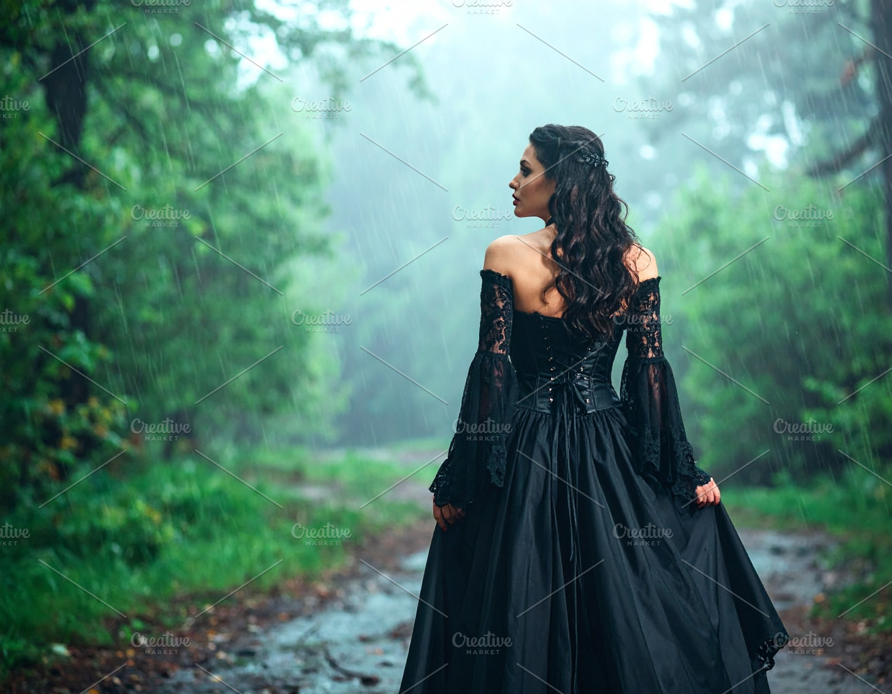 beautiful young goth woman in the rain in forest AI generated, a Photo by WorldOfPhotos