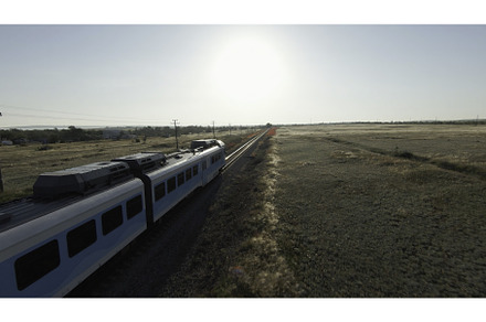 Drone is moving behind train. Shot, a Transportation Photo by Media Whale Stock