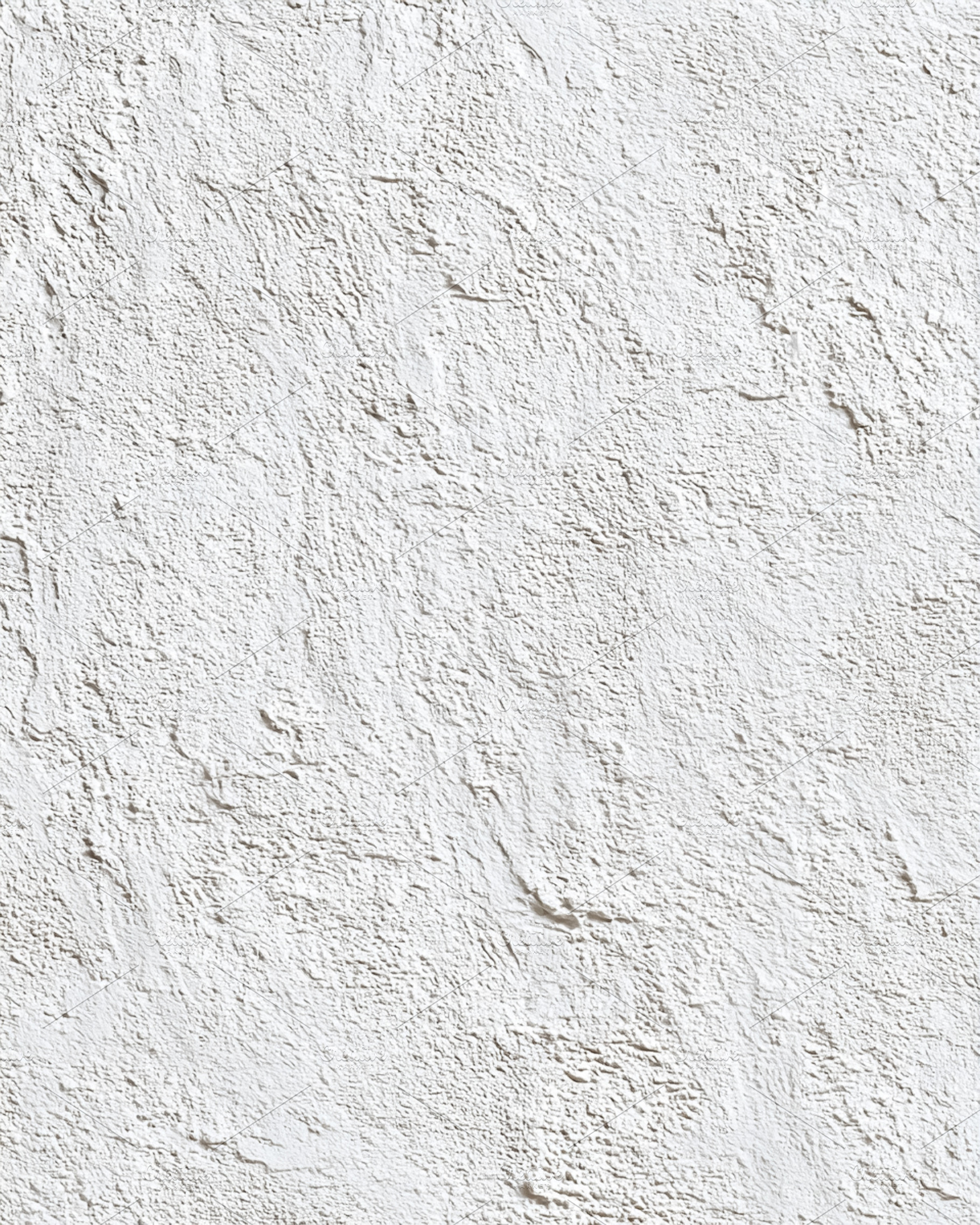 Rough white stucco wall texture creating a grainy surface. Neutr, a Photo by Studio ANNA