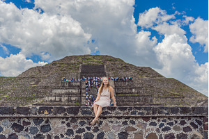 Female tourist standing in front of, a Person Photo by Elizaveta Galitskaya