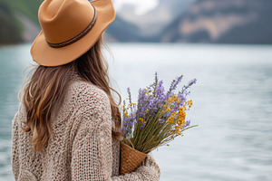 Woman in a cozy sweater and hat hold, a Person Photo by MistyDay