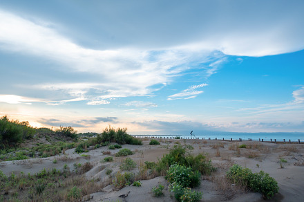 Quiet beach landscape at sunset, a Holiday Photo by Miguel Guasch