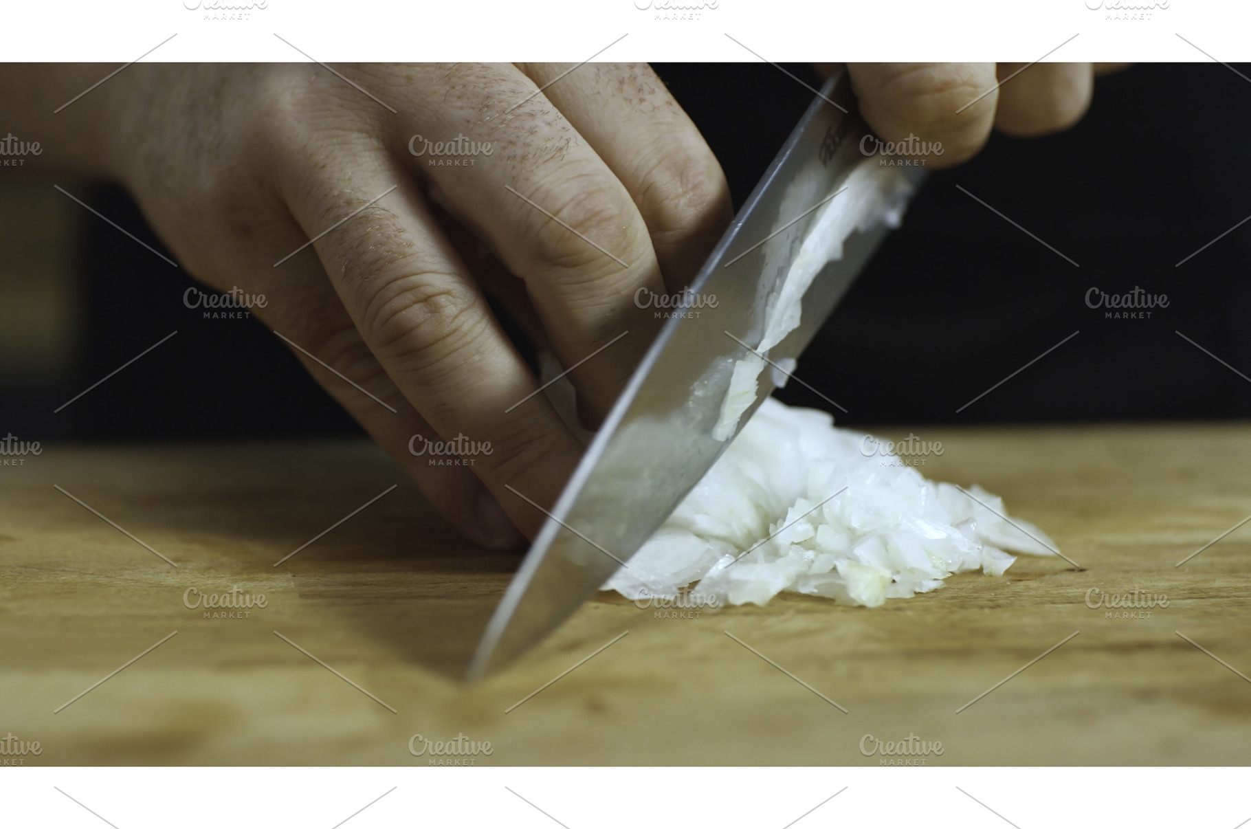 Close-up of man hands cutting white, a Food & Drink Photo by Media Whale Stock