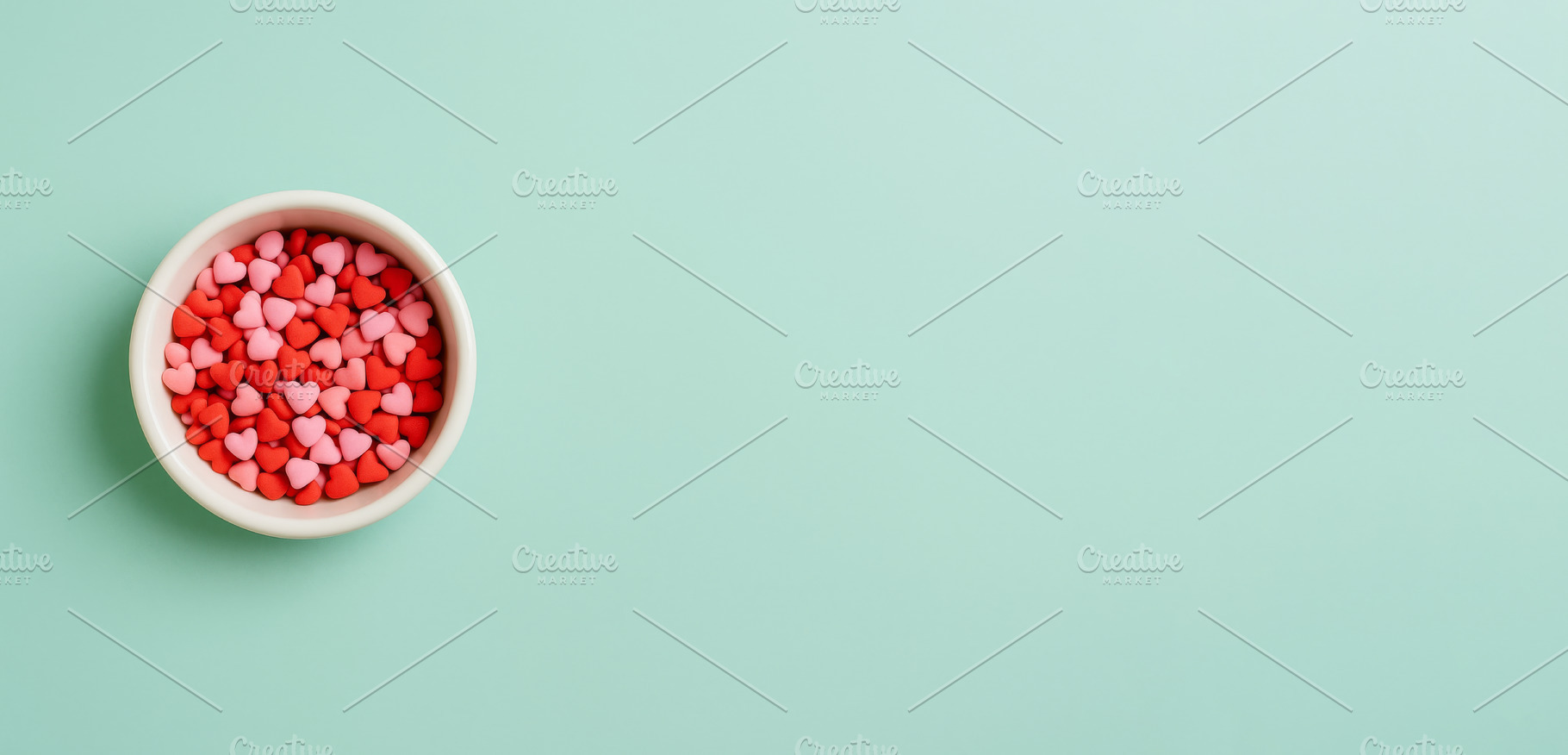 Valentine candy hearts in a bowl on, a Photo by Dvoevnore photos