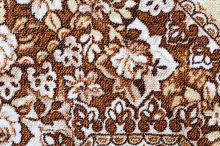 Fragment of colorful retro tapestry textile pattern with floral ornament useful, an Abstract Photo by Artsaba Family