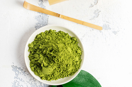 Green matcha tea powder and tea accessories on white background featuring, a Food & Drink Photo by Ekaterina_Markelova