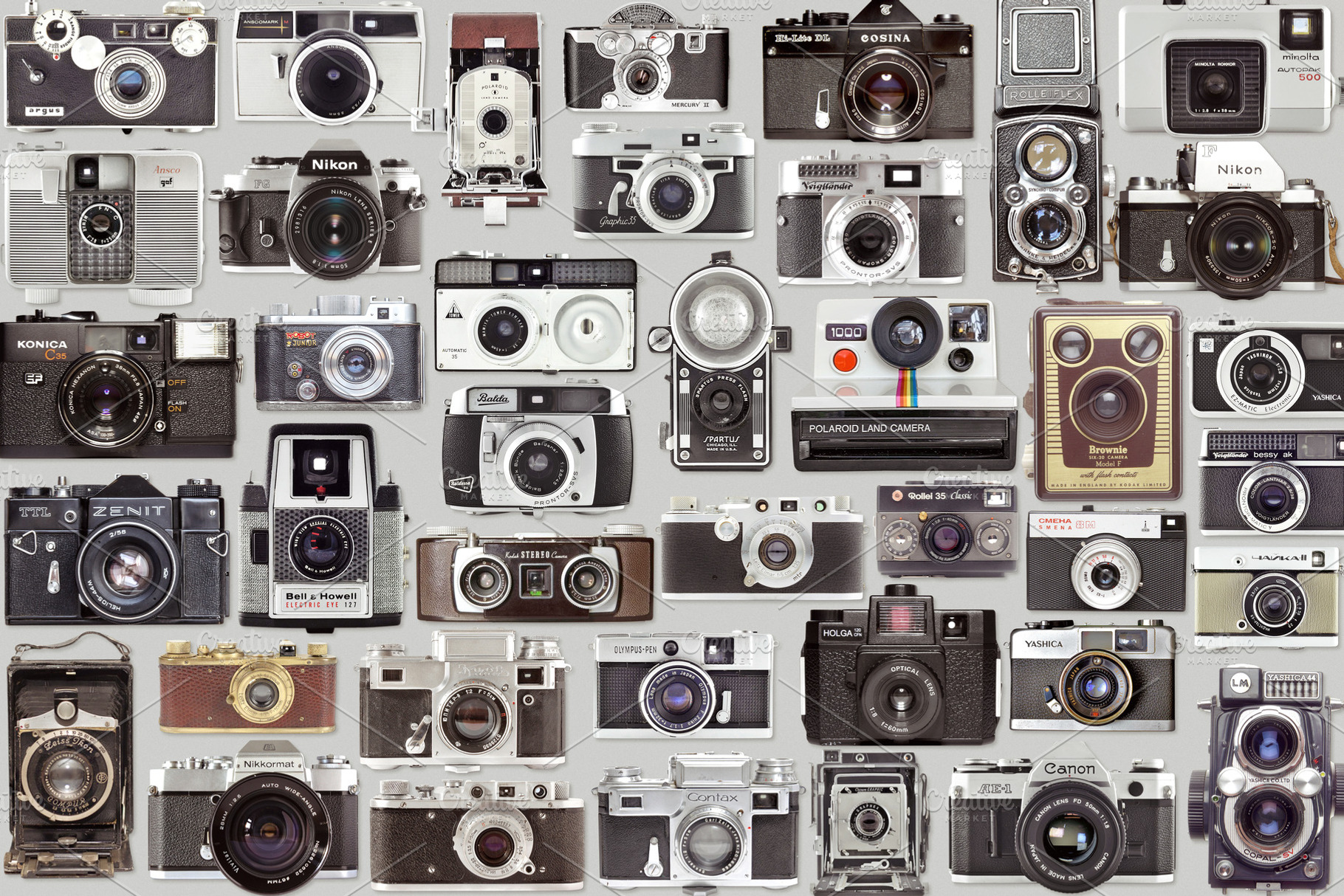 Set of an old vintage photo cameras, a Technology Photo by BOOCYS