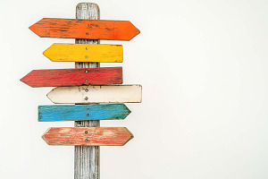 Wooden post with directional signs, a Graphic by VetalStock