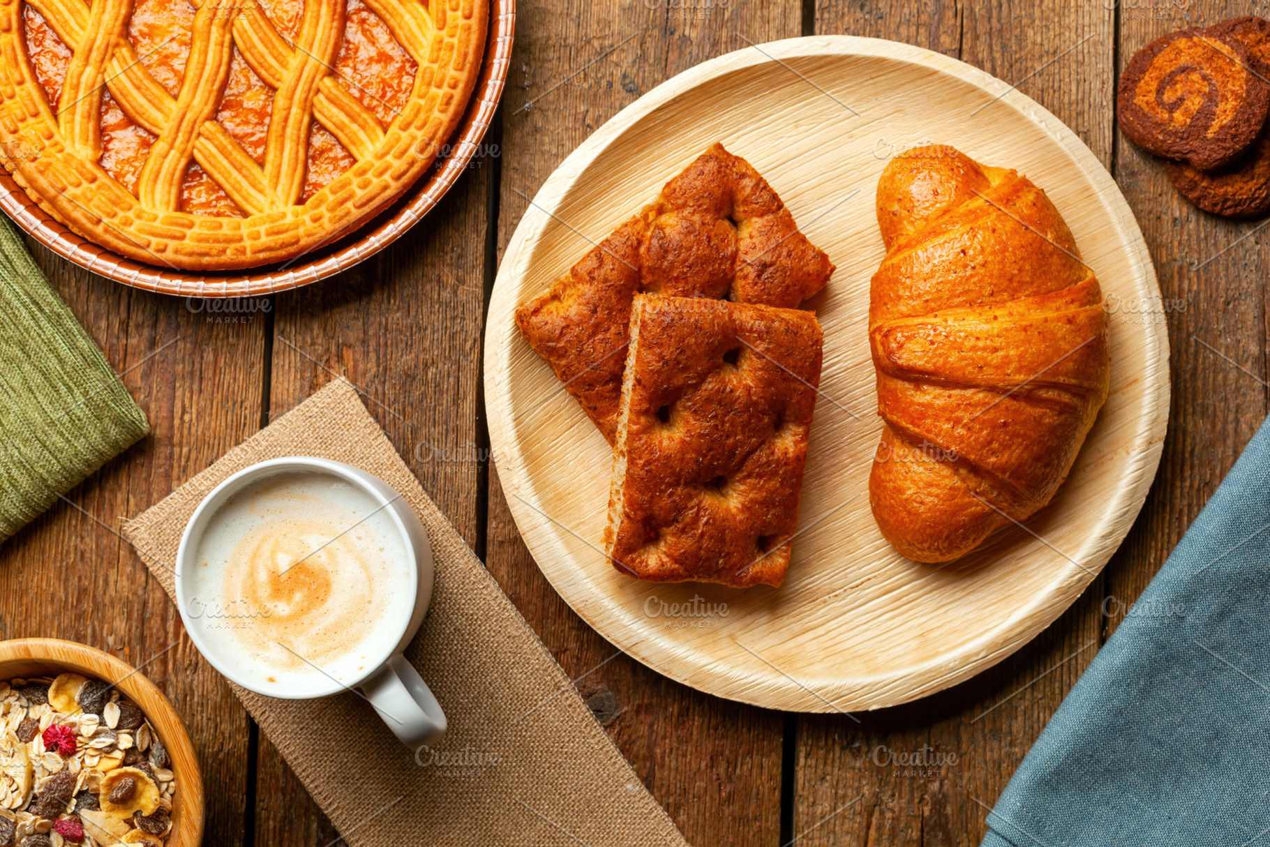 Delicious Italian breakfast with cappuccino, croissant, schiacciata and crostat, a Food & Drink Photo by Antonio Gravante Market