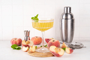 Flat peach martini or margarita or lemonade, a Food & Drink Photo by Rimma