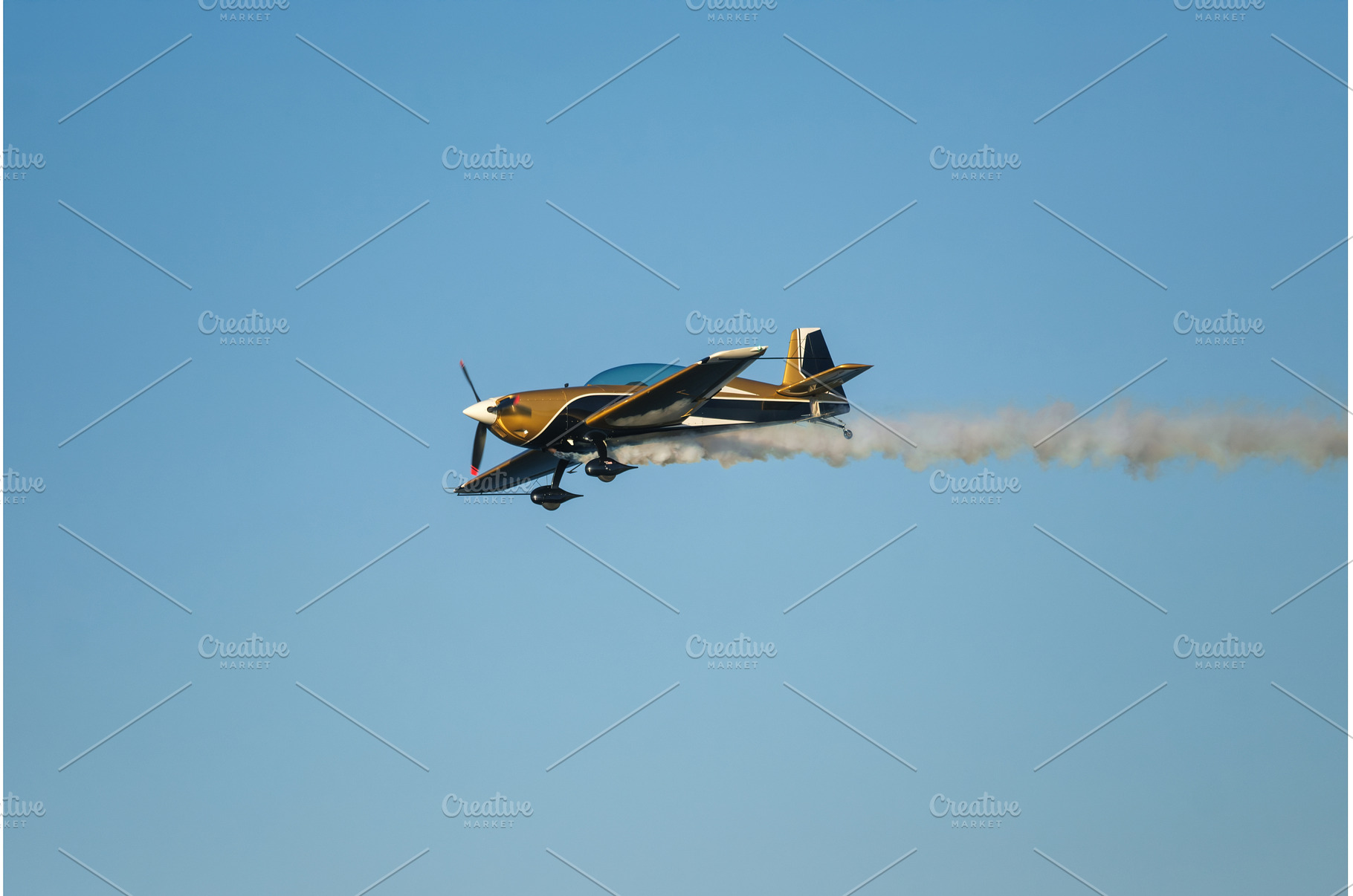 Stunt aerobatic plane performing, a Nature Photo by f9photos
