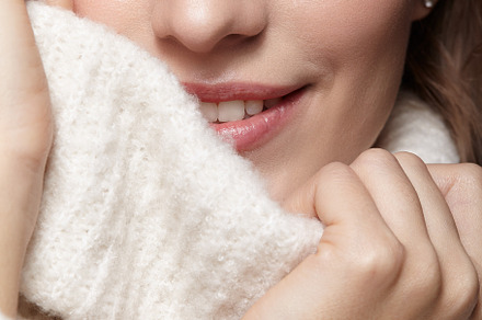 Blonde young beautiful woman dressed in white woolen sweater ., a Person Photo by Zastavkin