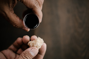 Eucharist containing receiving, hands, and holding