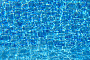 Blue water in pool beautiful background slow motion close up containing blue
