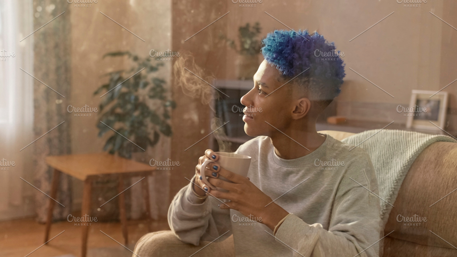 Person with blue hair holding cup indoors, a Photo by DanFLCreativo