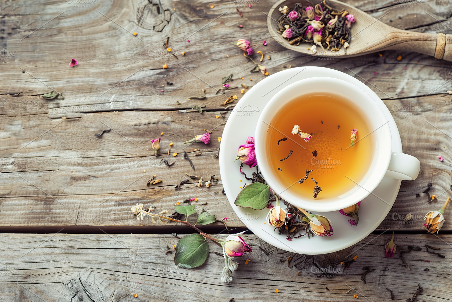 White cup of aromatic tea on wooden table, a Food & Drink Photo by AlyaAnd