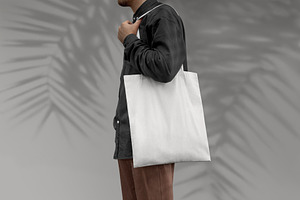 Man With White Tote Bag