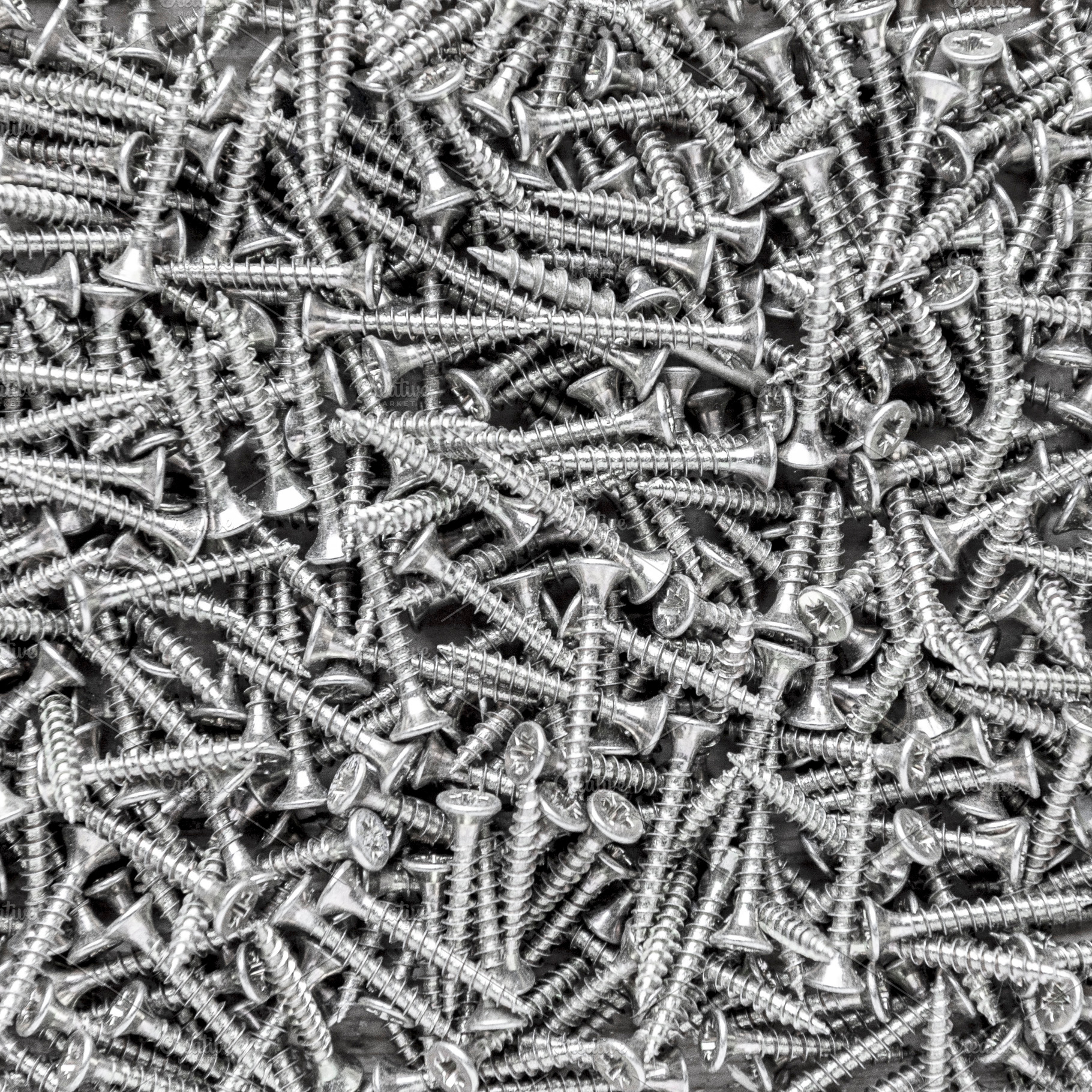 Metal screws background and texture, an Industrial Photo by BOOCYS
