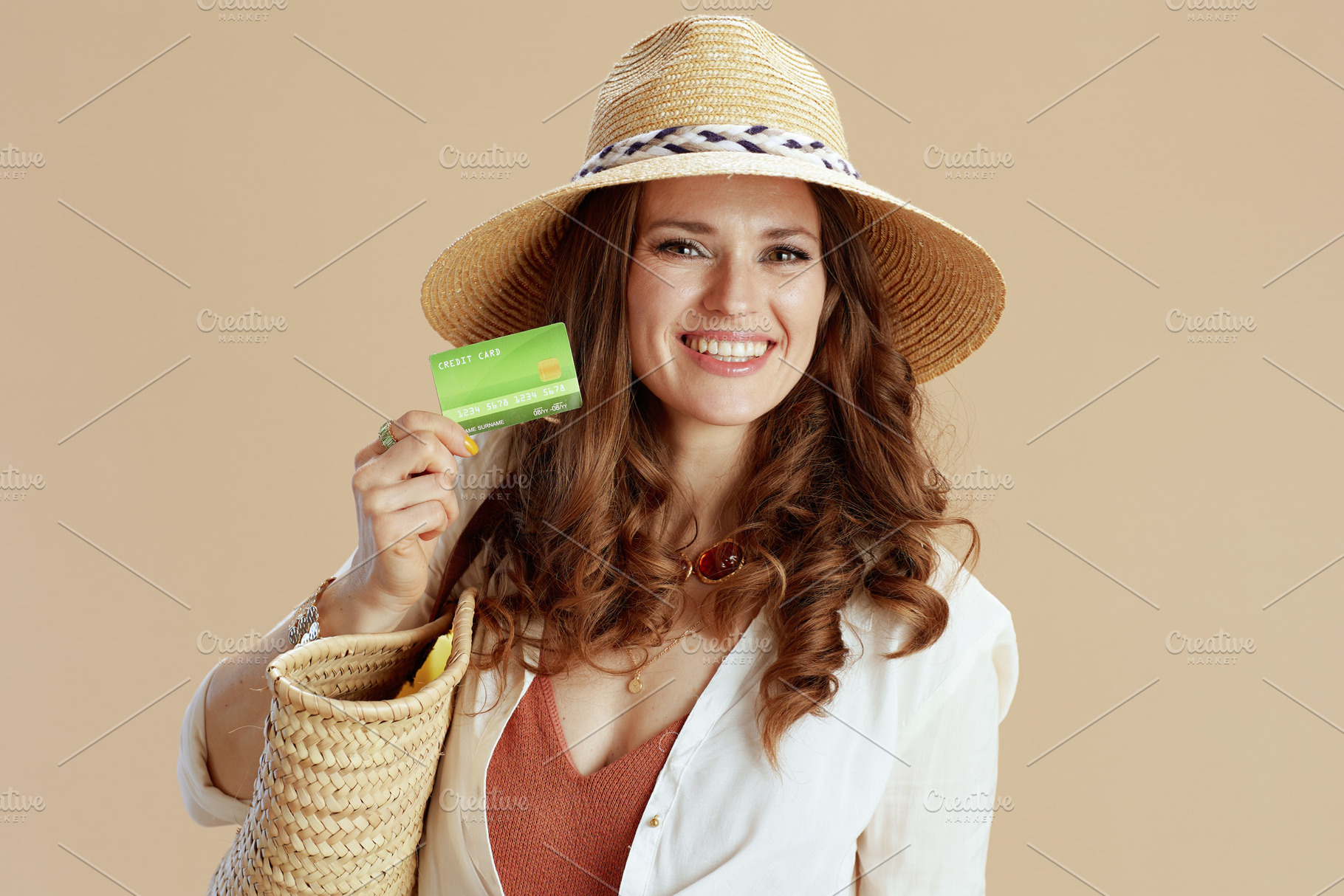 happy elegant woman in blouse and shorts isolated on beige, a Person Photo by Alliance Images