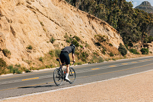 Cyclist on a bike, a Sports & Recreation Photo by Artem Varnitsin