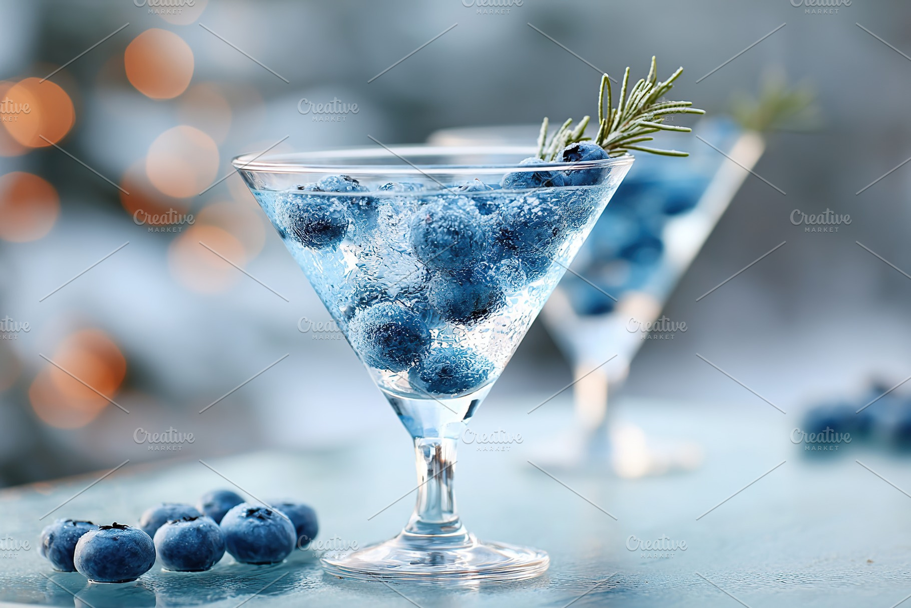 Blueberry martini cocktail with rosemary garnish, a Food & Drink Photo by AlyaAnd