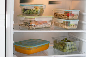 Organized Refrigerator with Healthy Meal Prep Containers and Fresh Food, a Food & Drink Photo by etorres69