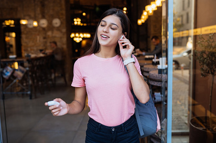 Beautiful girl with wireless headpho