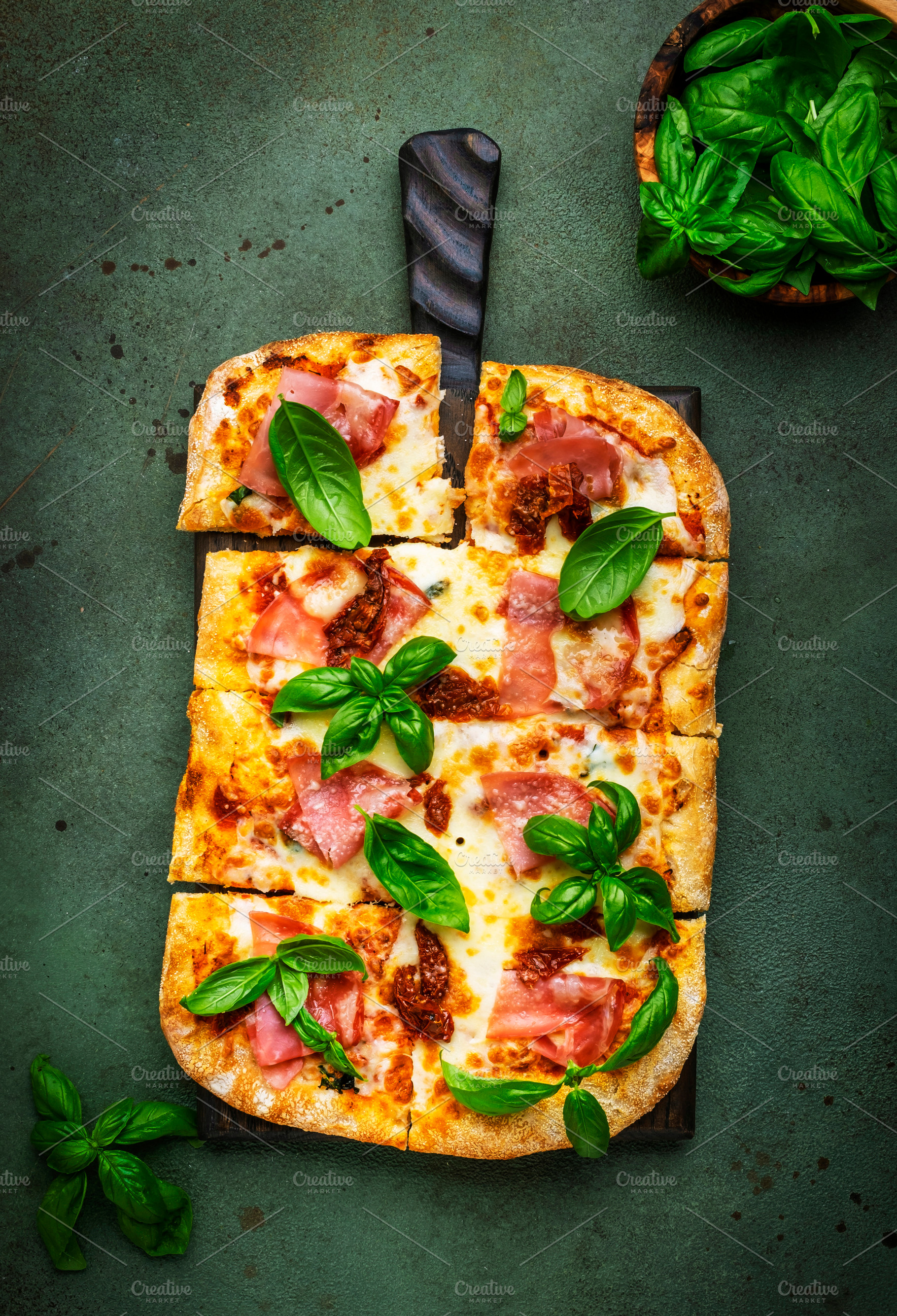 Hot Roman pizza with ham, pancetta, mozzarella cheese, sun dried, a Food & Drink Photo by 5PH