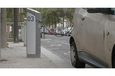 Electric car at power supply station, a Transportation Photo by Grey Coast Media
