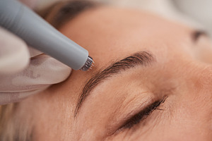 Tackling the signs of ageing while boosting her glow, a Photo by Peopleimages.com