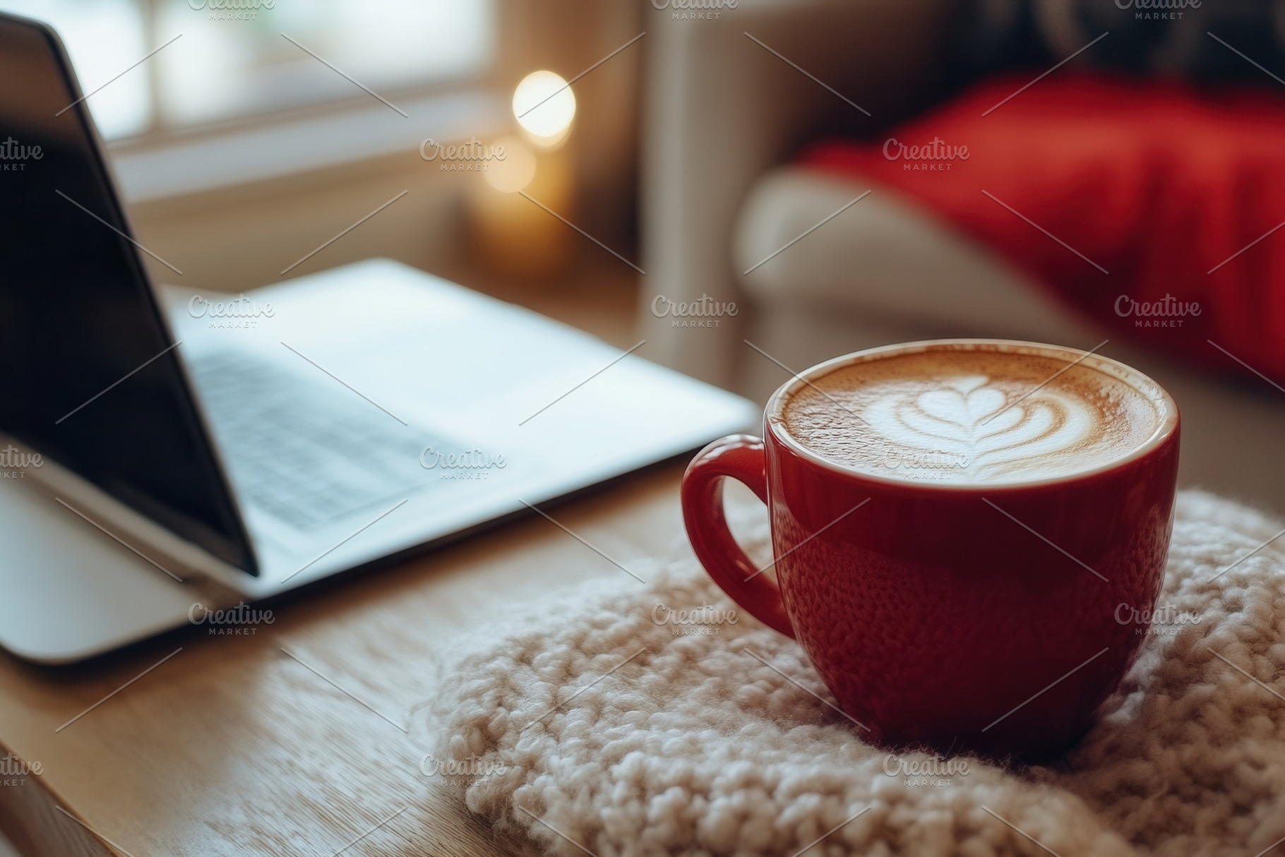 A red coffee cup rests on the table, a Photo by Pavel_design
