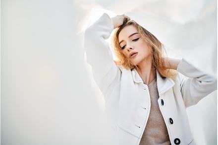 Young attractive woman in white, a Beauty & Fashion Photo by Gladkov photography
