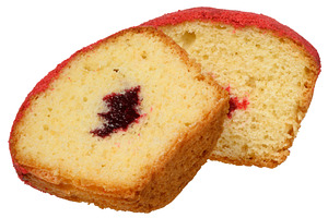 Cross section of a baked muffin red, jam filling visible in the, a Food & Drink Photo by ndanko