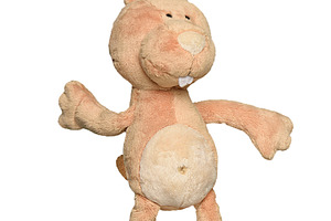 Soft plush toy in the form of a beige hare with long ears and bi, an Animal Photo by ndanko