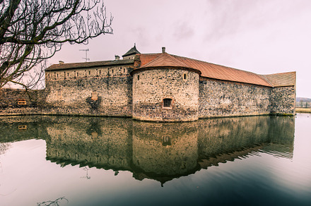 Medieval castle with water canals, a Holiday Photo by PhotoVision Pavel Rezac