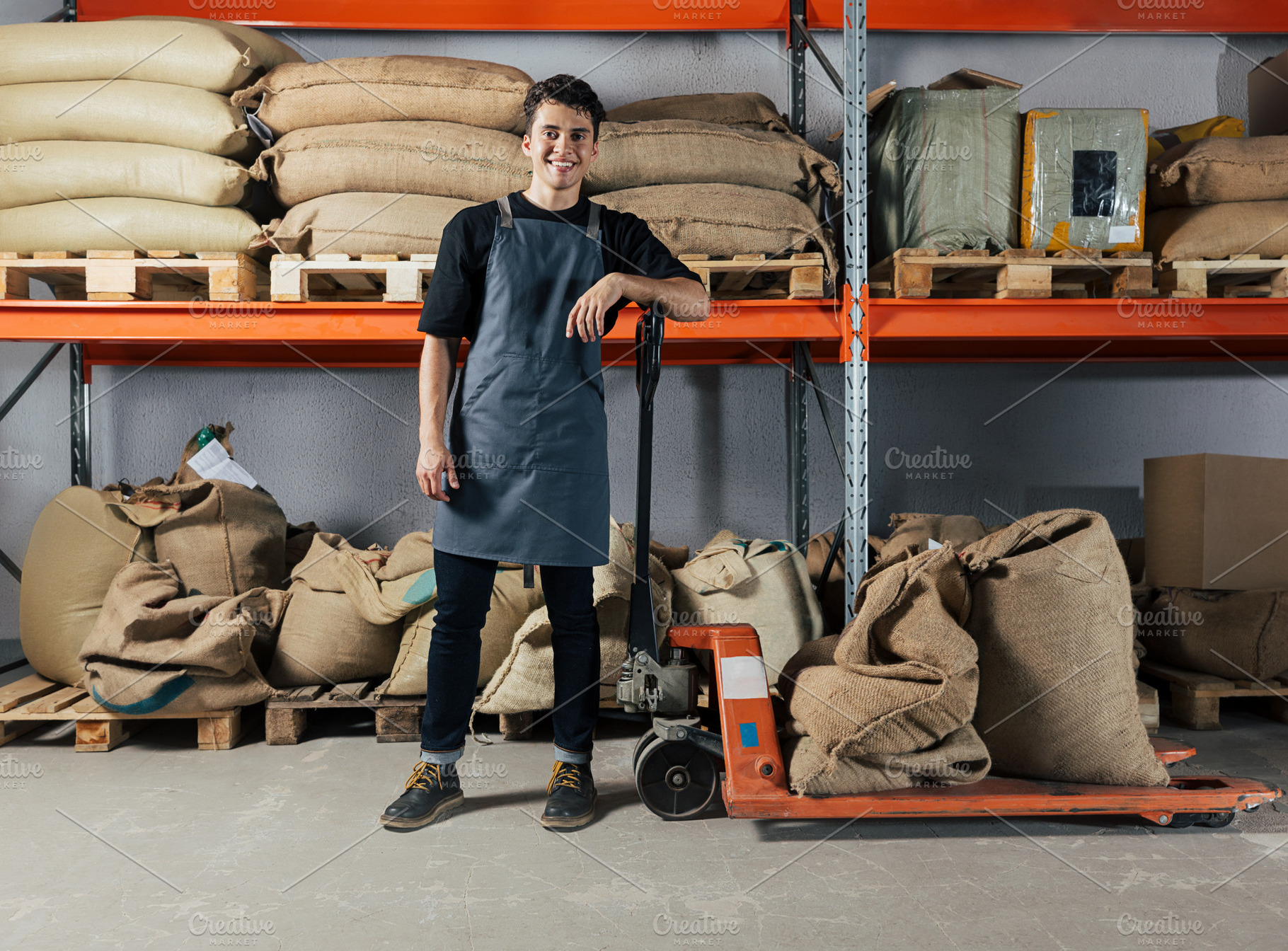 Smiling warehouse worker, a Person Photo by Artem Varnitsin