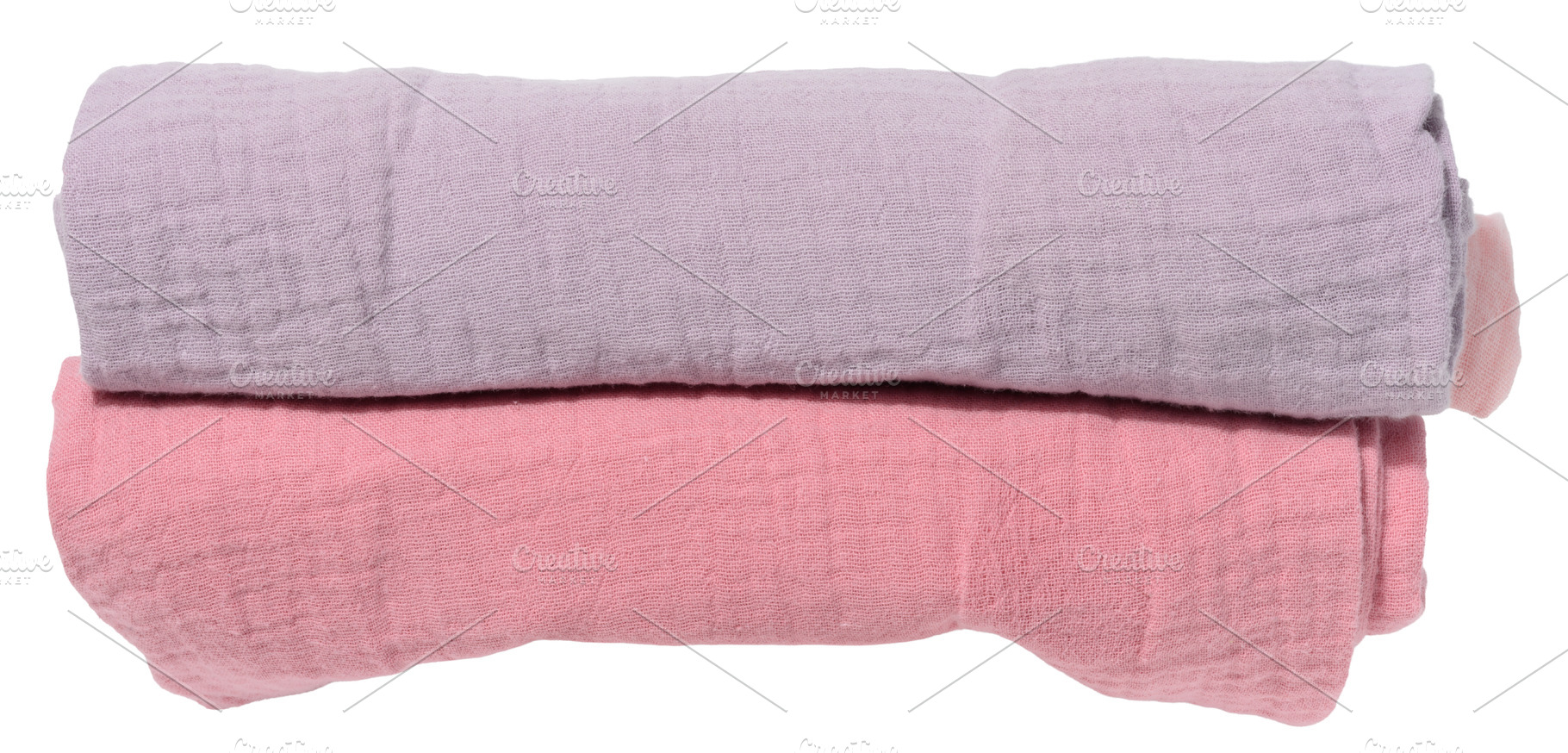 Stack of folded cotton towels in pastel shades on isolated backg, an Abstract Photo by ndanko