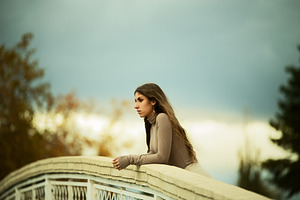 Thoughtful young woman leaning on a, a Person Photo by Perpis