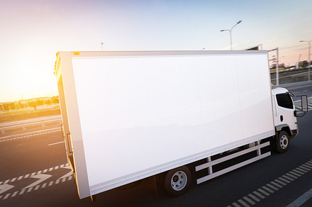Commercial cargo delivery truck with blank white trailer driving on highway, a Transportation Photo by Photocreo Michal Bednarek