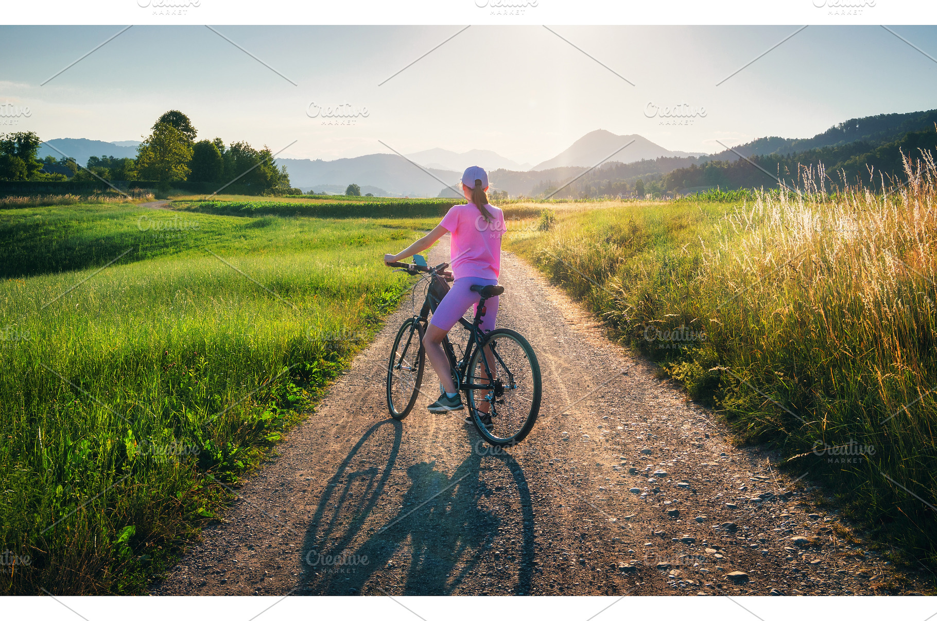Woman on mountain bike on gravel, a Sports & Recreation Photo by den-belitsky