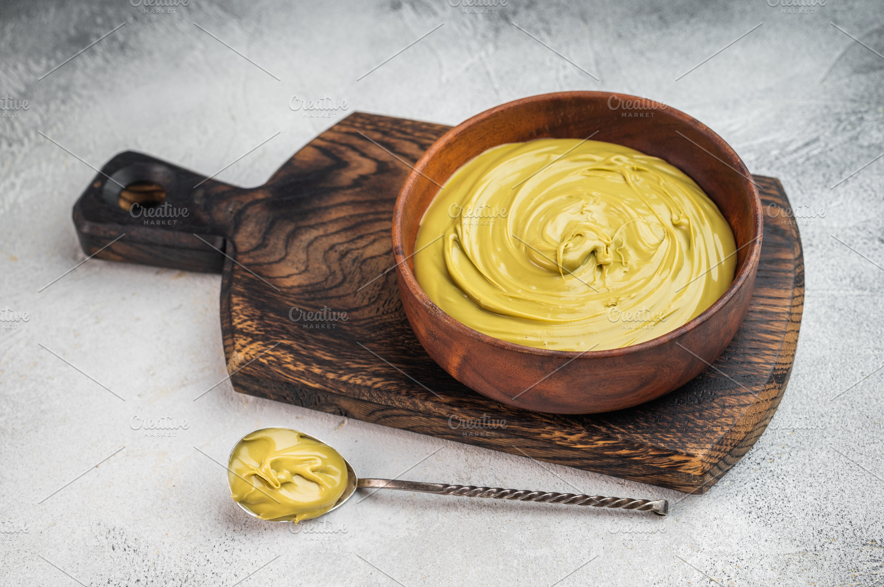 Sweet pistachio cream spread with rich green color served in woo, a Food & Drink Photo by composter-box@mail.ru