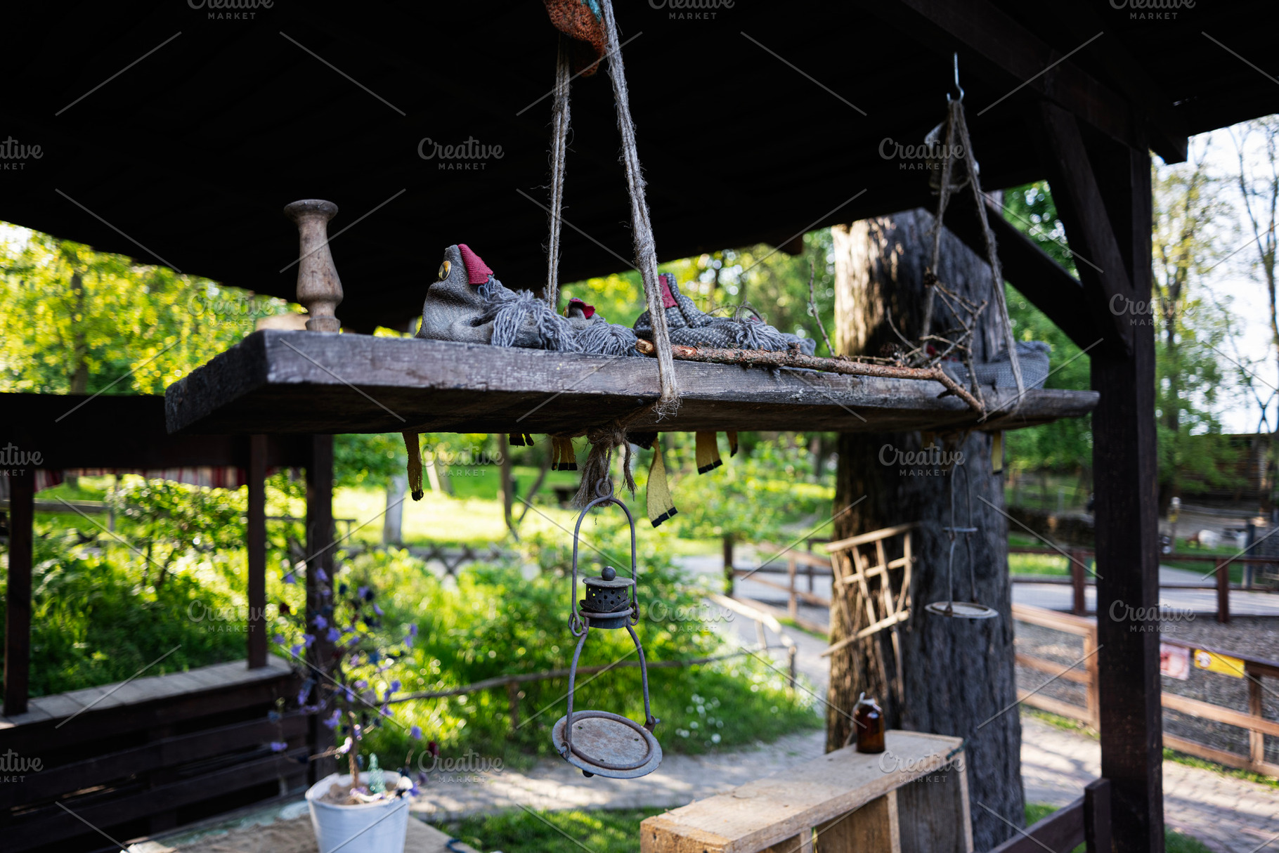 Rustic outdoor decor with farm ambiance and vintage elements on wooden surfaces, a Photo by AS photostudio