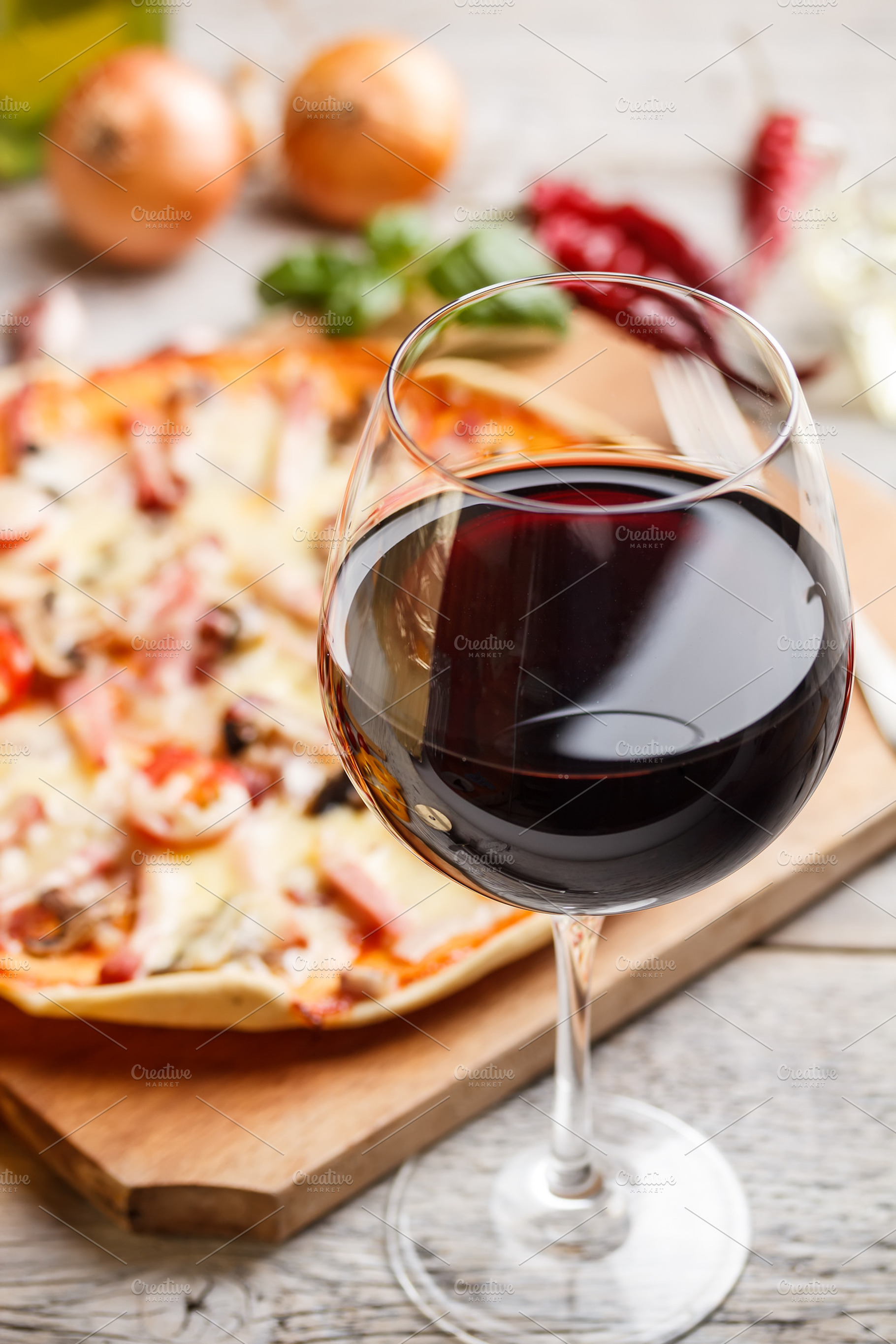 Glass of red wine containing red, wine, and glass