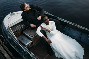 Beautiful wedding couple in a boat